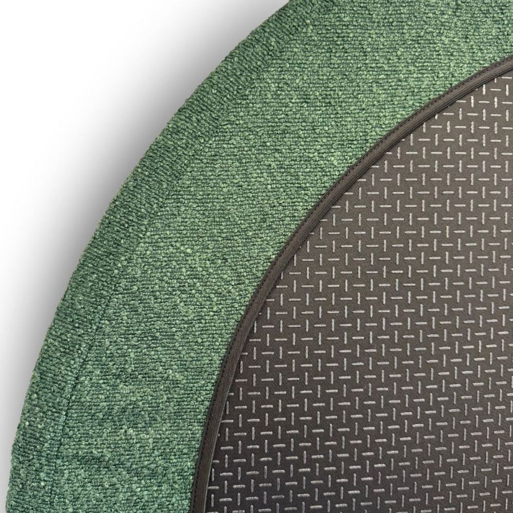 Close-up of the bed's bouclé cover and orthopaedic base
